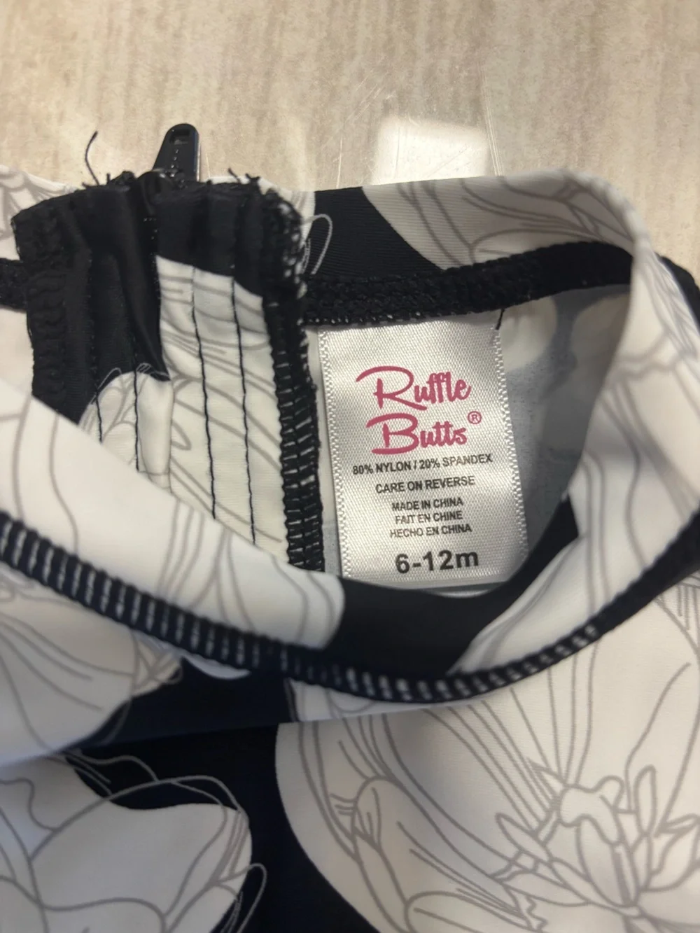 Ruffle Butts Baby Girl Black And White Floral Swim Suit Size 6-12 Months
